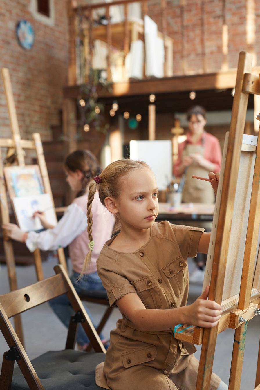 Girl Sitting at Art Studio